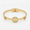 Bracelete Rigido Aco Inoxidavel Dourado com Medalhao Cravejado