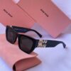 Óculos de Sol Miu Miu Modelo 007