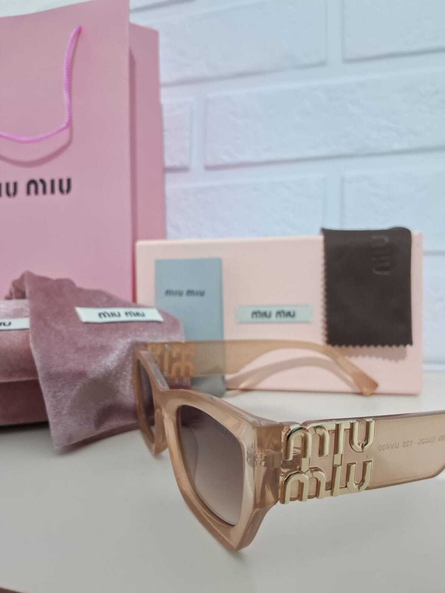 Óculos de Sol Miu Miu Transparente Marrom