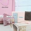 Óculos de Sol Miu Miu Transparente