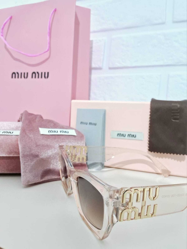 Óculos de Sol Miu Miu Transparente
